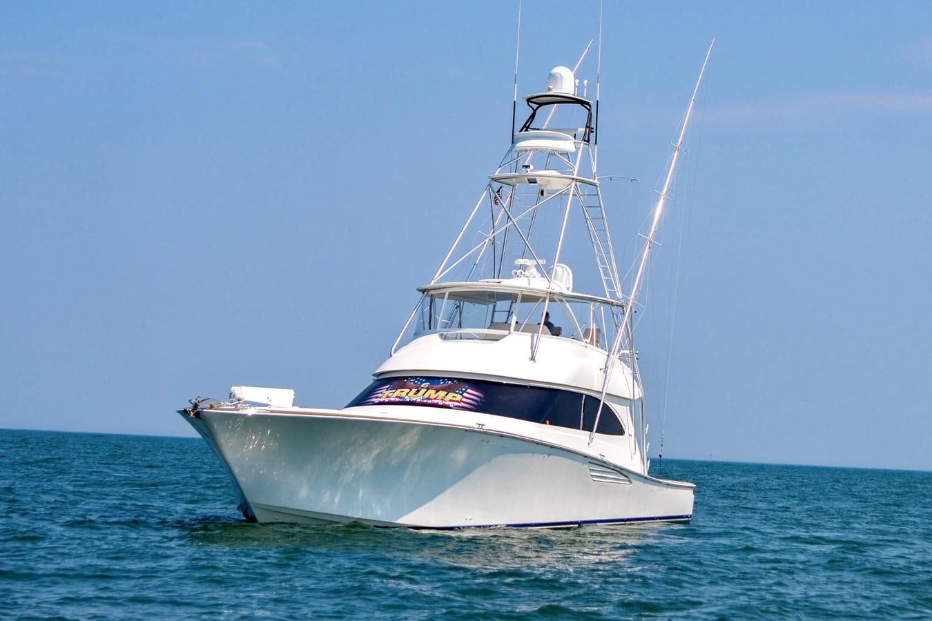 a white boat in the water aboard LIFE IS GOOD Yacht for Sale