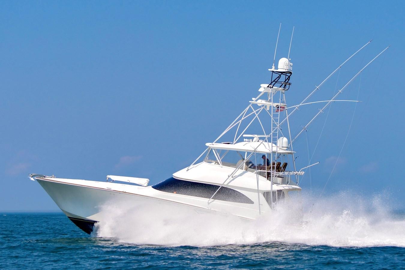 a white boat in the water aboard LIFE IS GOOD Yacht for Sale