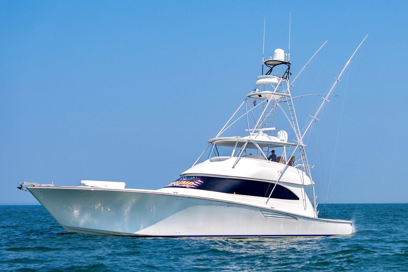 a white boat in the water aboard LIFE IS GOOD Yacht for Sale