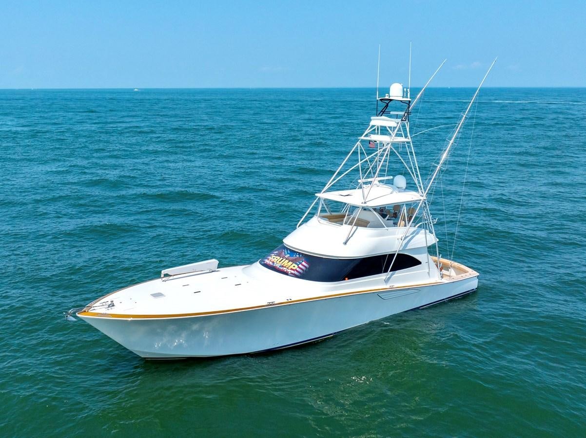 a white boat in the water aboard LIFE IS GOOD Yacht for Sale