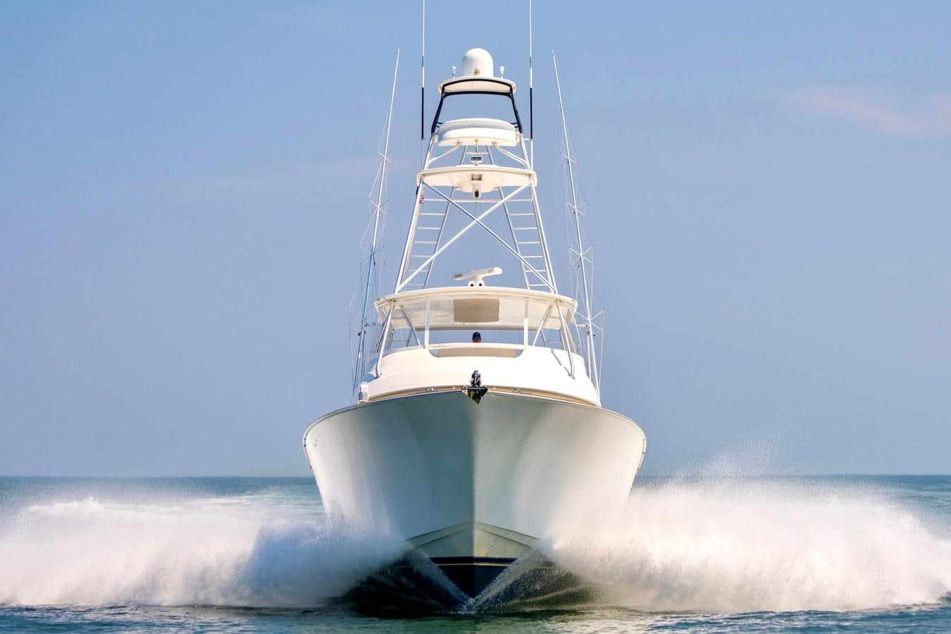 a white boat in the water aboard LIFE IS GOOD Yacht for Sale