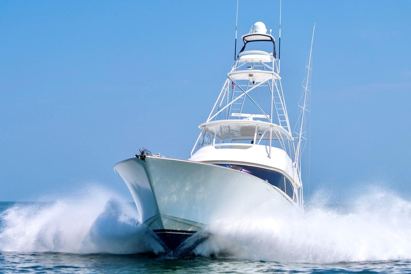 a large white ship in the water aboard LIFE IS GOOD Yacht for Sale