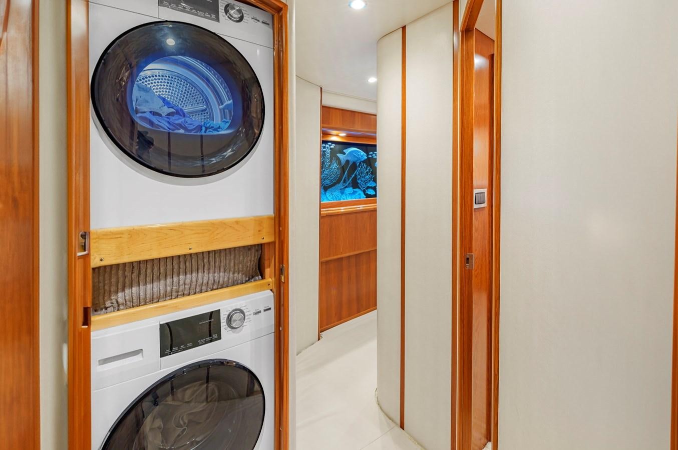 a washer and dryer in a room aboard LIFE IS GOOD Yacht for Sale