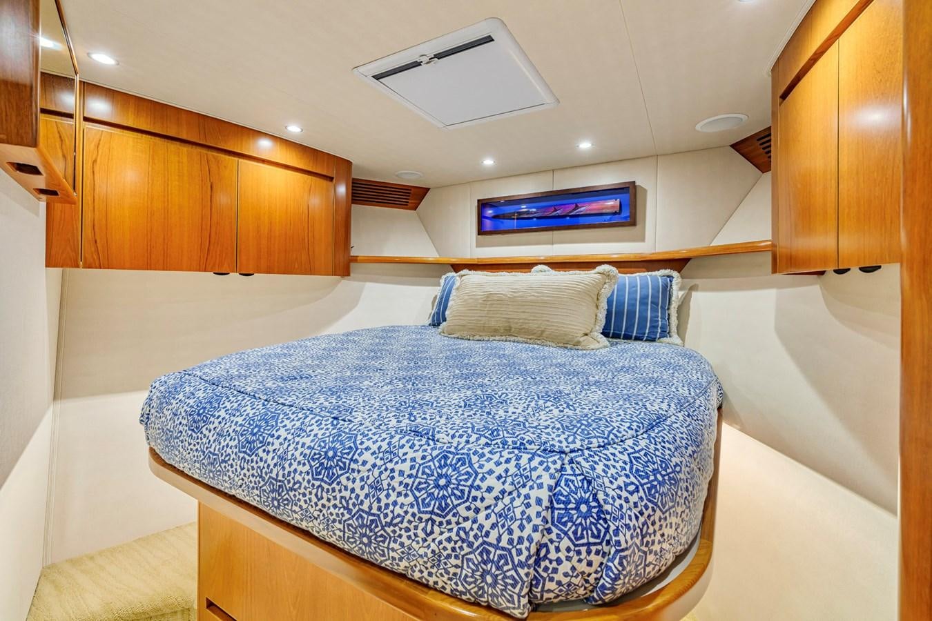 a bed in a room aboard LIFE IS GOOD Yacht for Sale