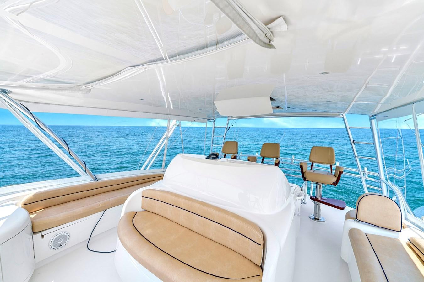 a boat with chairs and a table aboard LIFE IS GOOD Yacht for Sale