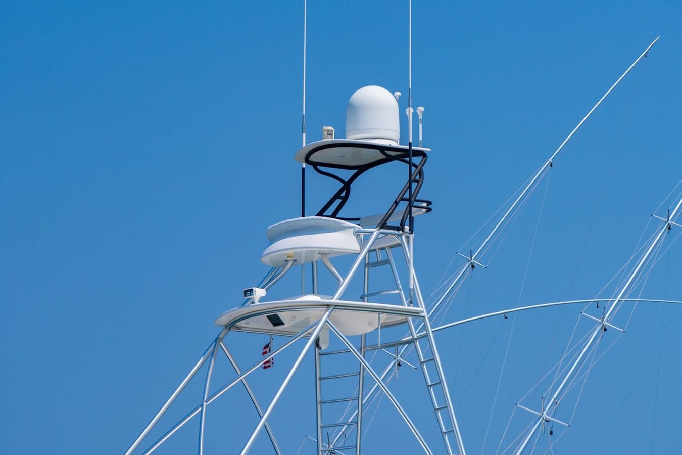 a white tower with a satellite dish aboard LIFE IS GOOD Yacht for Sale