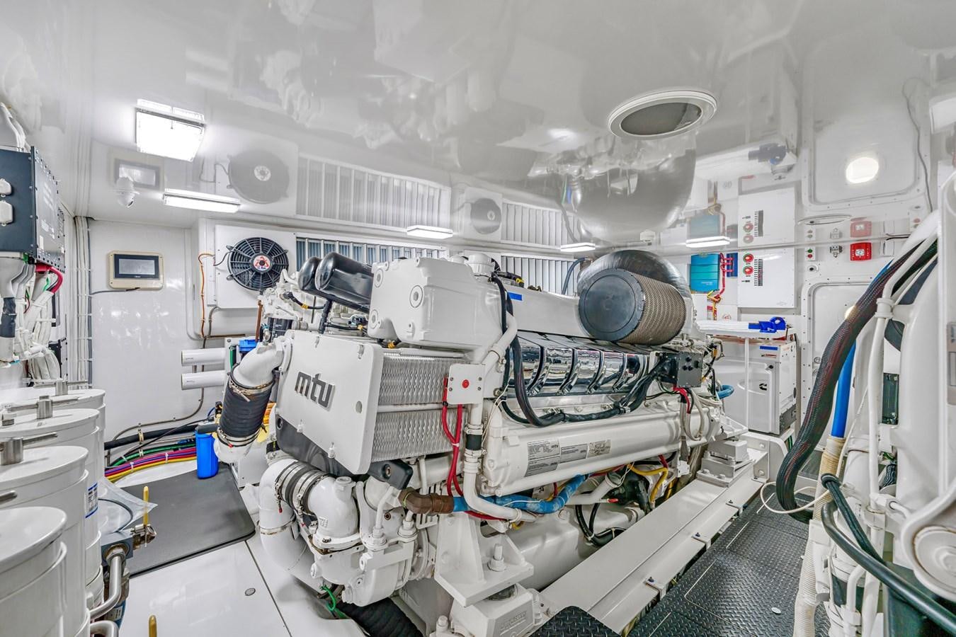 a room with white machines aboard LIFE IS GOOD Yacht for Sale