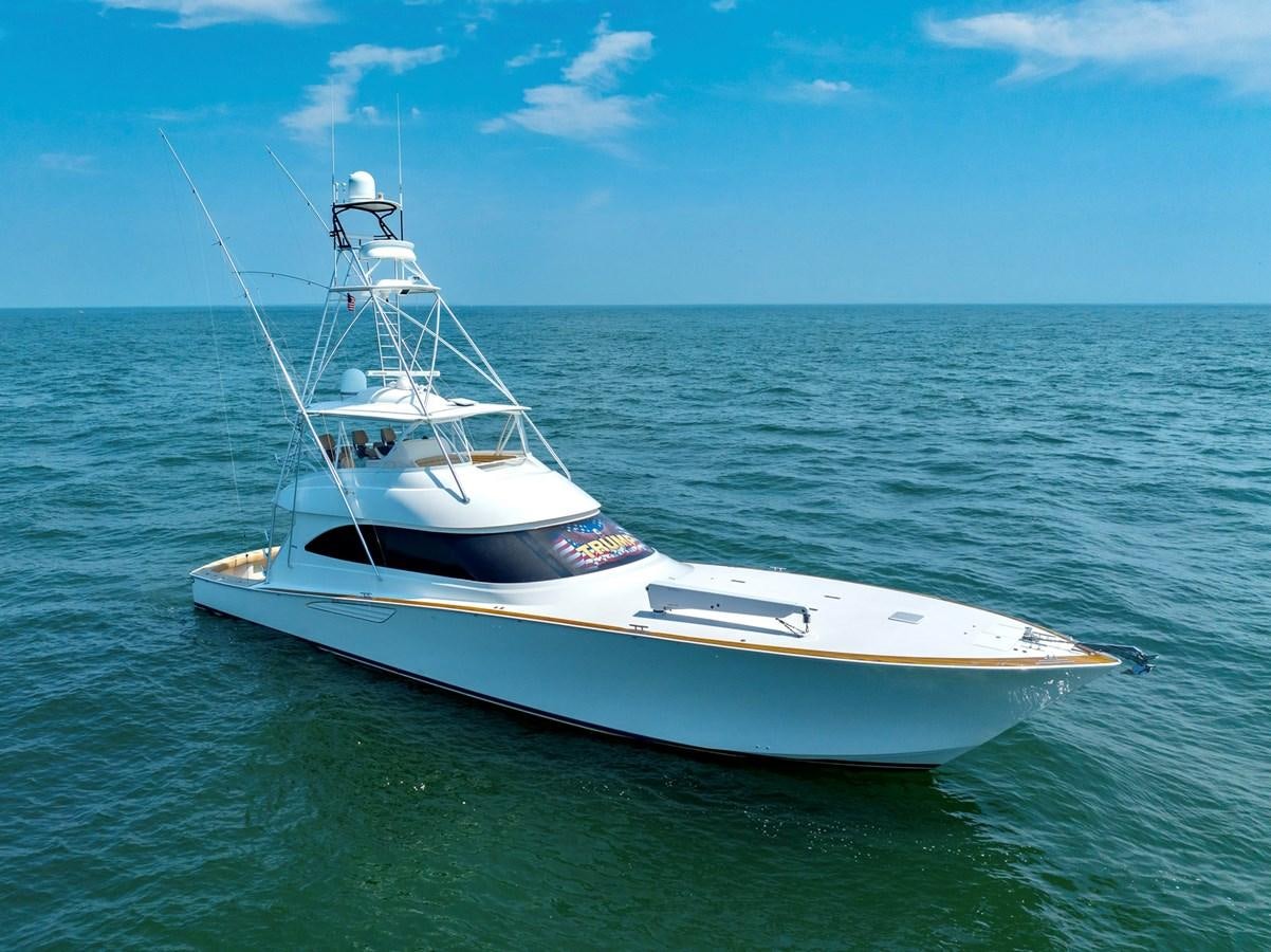 a white boat in the water aboard LIFE IS GOOD Yacht for Sale