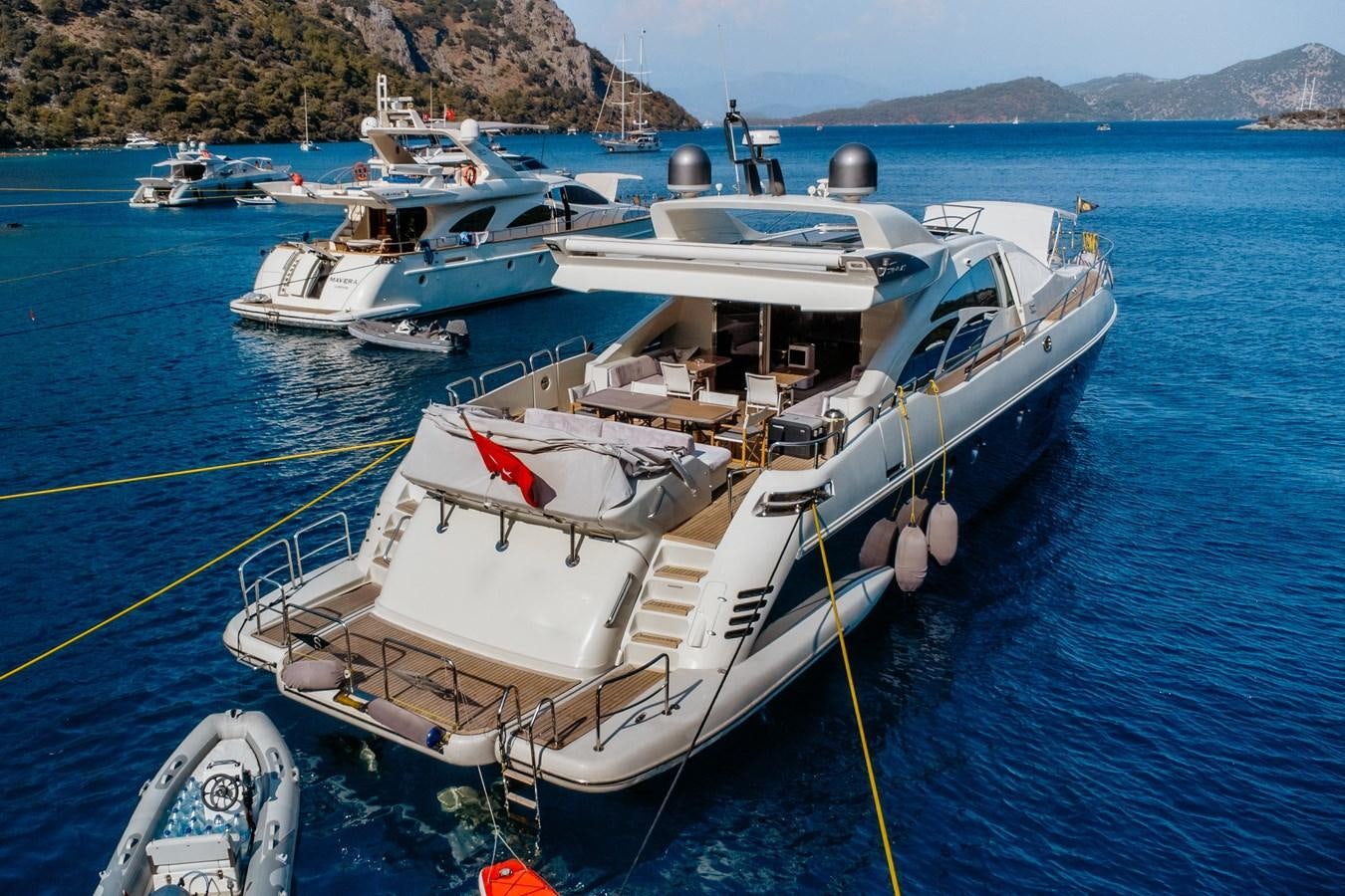 a boat tied to a dock aboard AZIMUT 86S Yacht for Sale