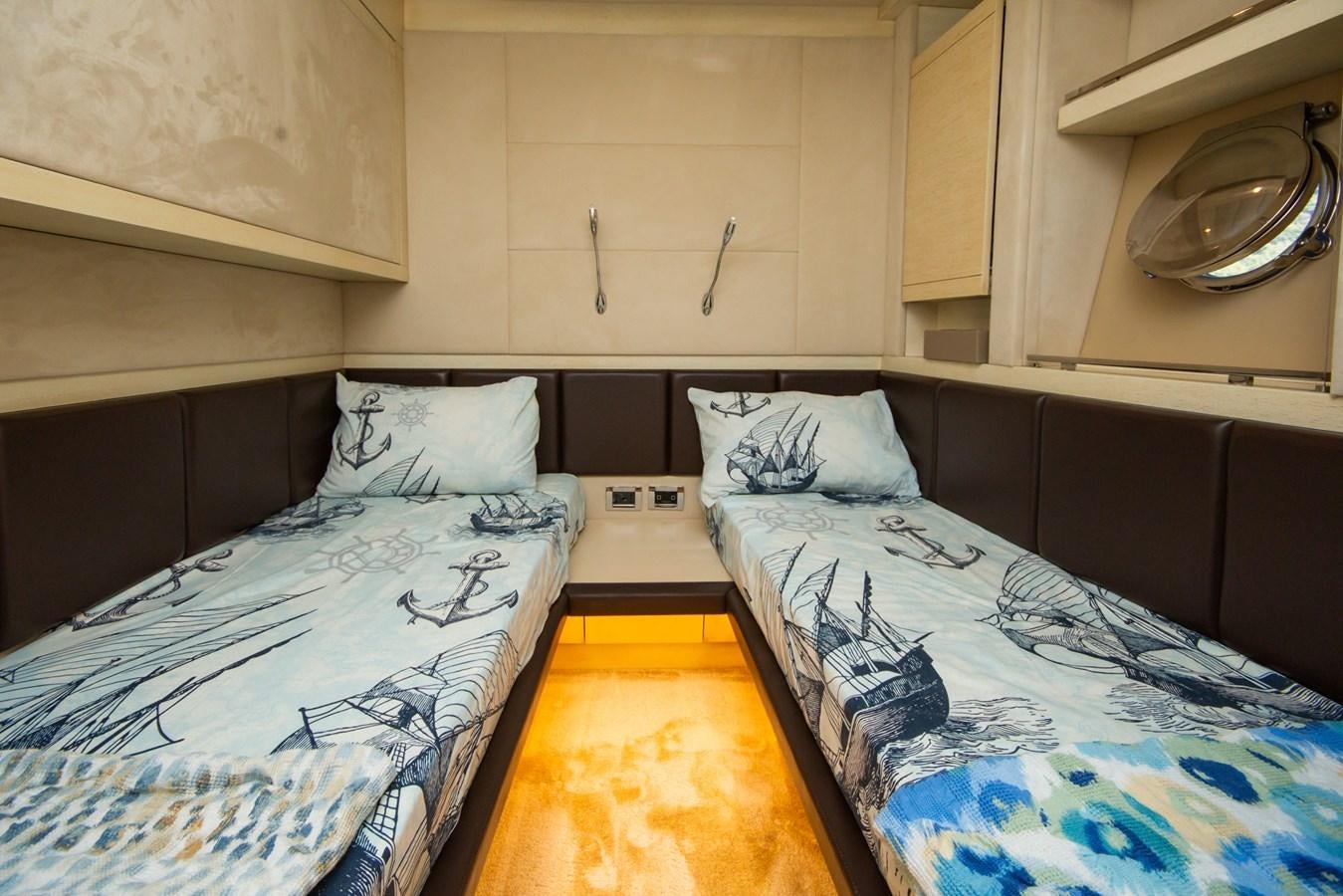 a couple of beds in a room aboard AZIMUT 86S Yacht for Sale