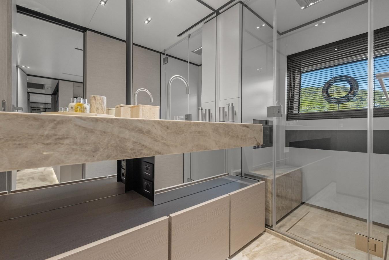 a large kitchen with marble counters aboard BUONGIORNO Yacht for Sale