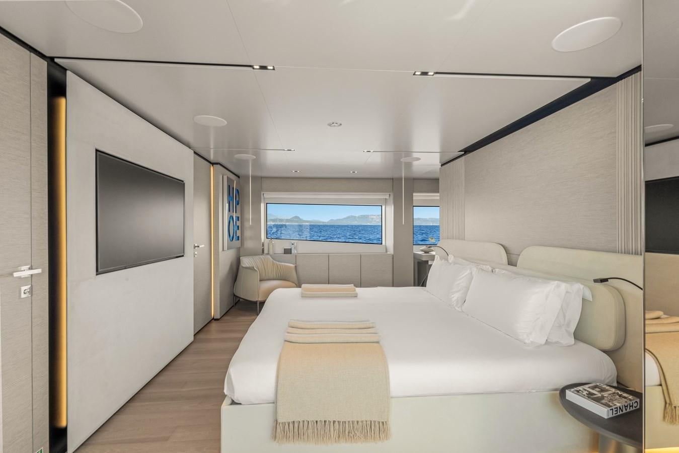 a living room with a large screen aboard BUONGIORNO Yacht for Sale