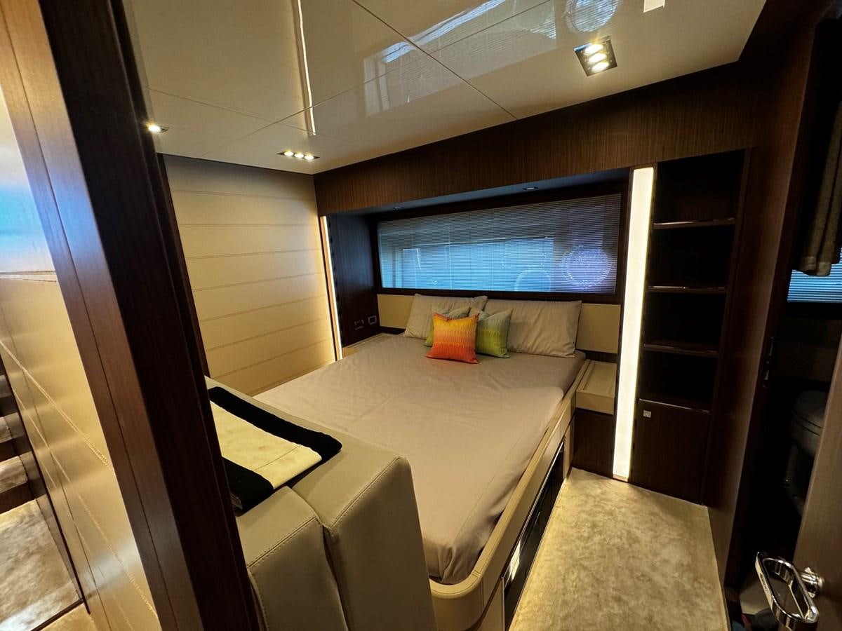 a room with a bed and a tv aboard M Yacht for Sale