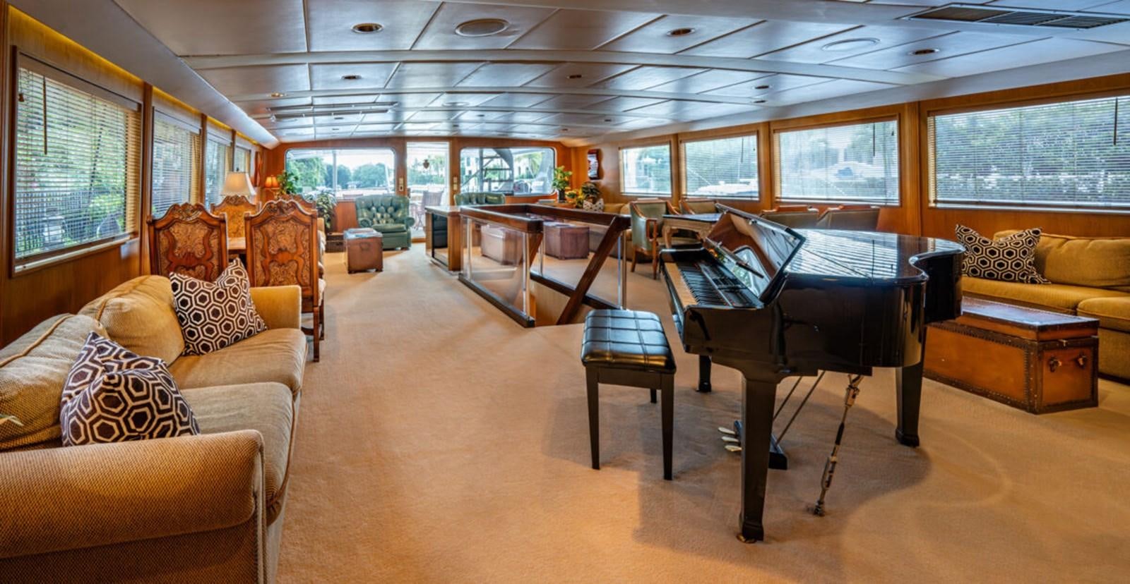 a large living room with a large open floor plan aboard LE MONTRACHET Yacht for Sale
