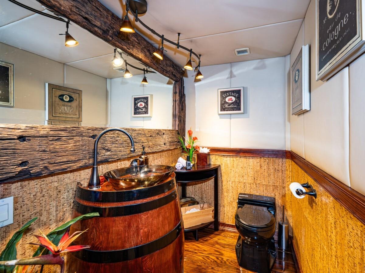 a kitchen with a large wood stove aboard LE MONTRACHET Yacht for Sale