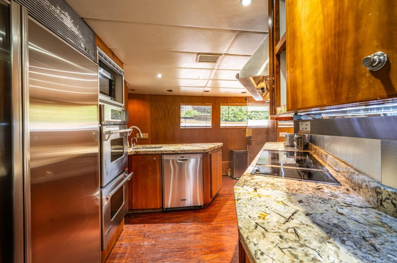 a kitchen with marble counters aboard LE MONTRACHET Yacht for Sale