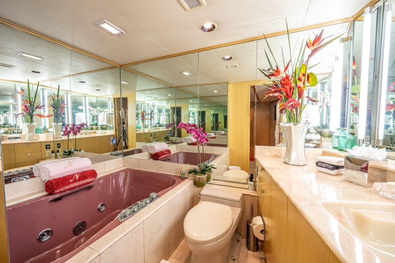 a bathroom with a large mirror aboard LE MONTRACHET Yacht for Sale