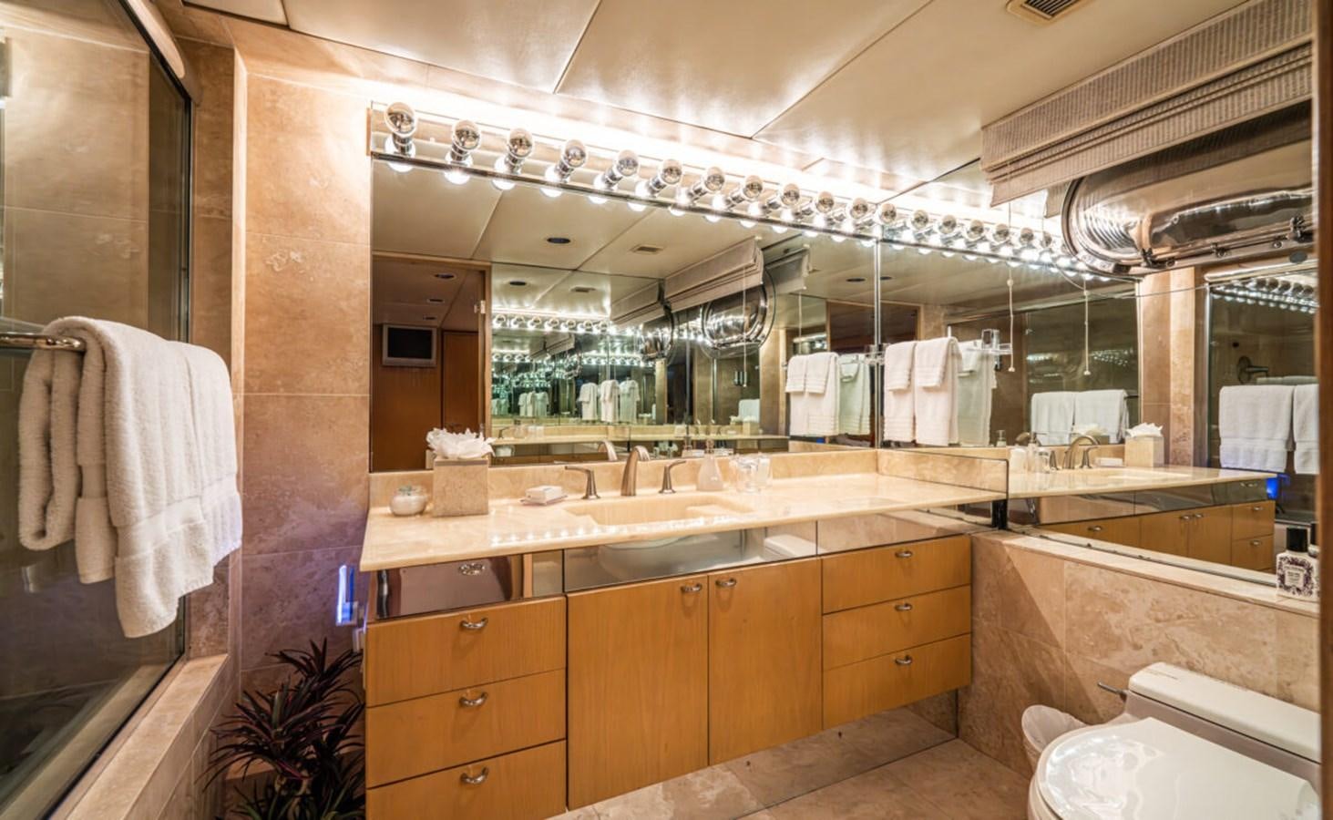 a bathroom with a large mirror aboard LE MONTRACHET Yacht for Sale