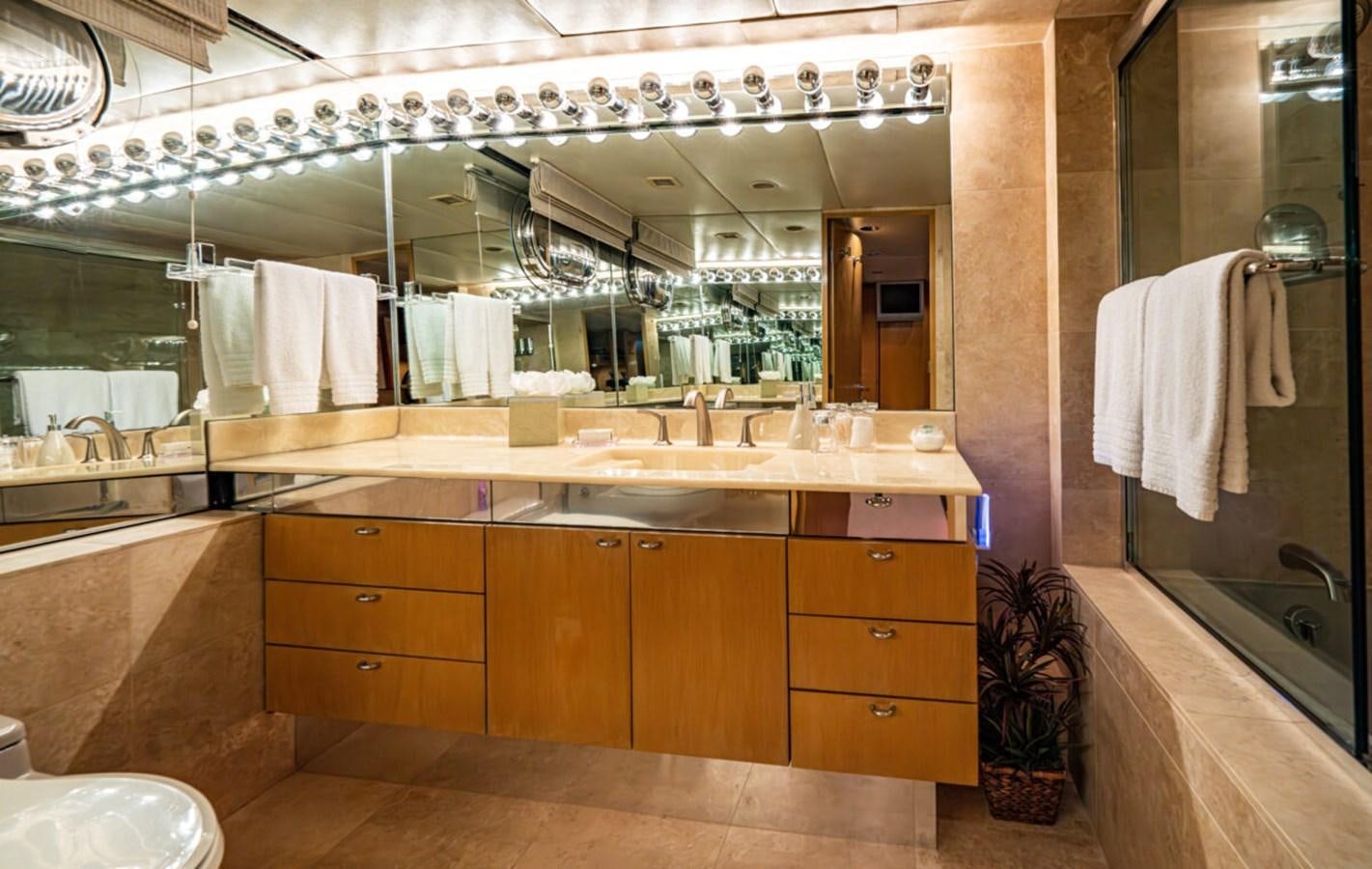 a bathroom with a large mirror aboard LE MONTRACHET Yacht for Sale