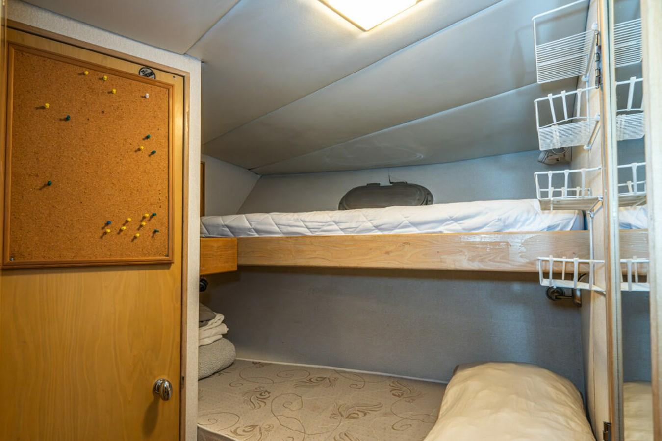 a room with bunk beds aboard LE MONTRACHET Yacht for Sale
