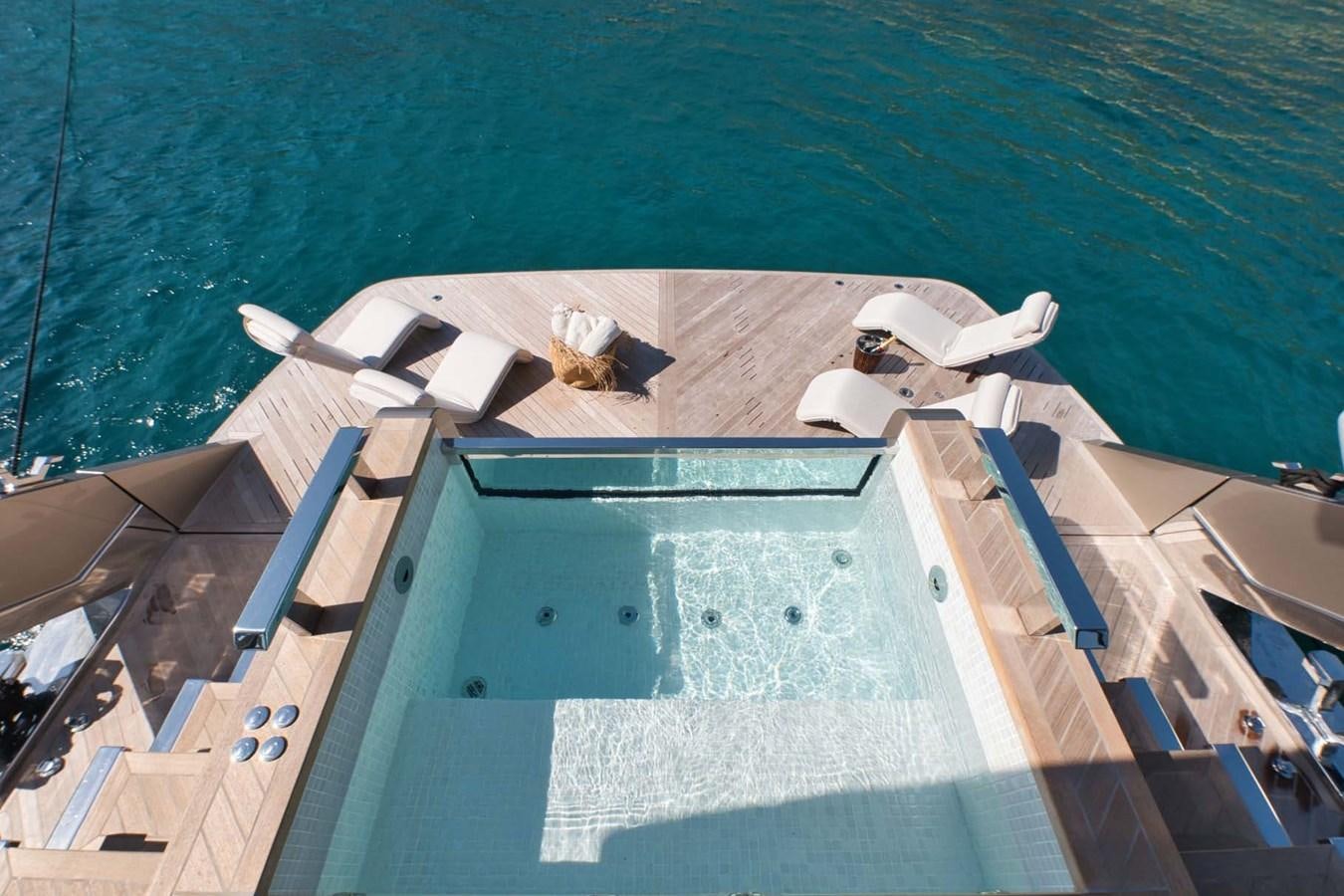 a large boat on the water aboard ROCK X Yacht for Sale