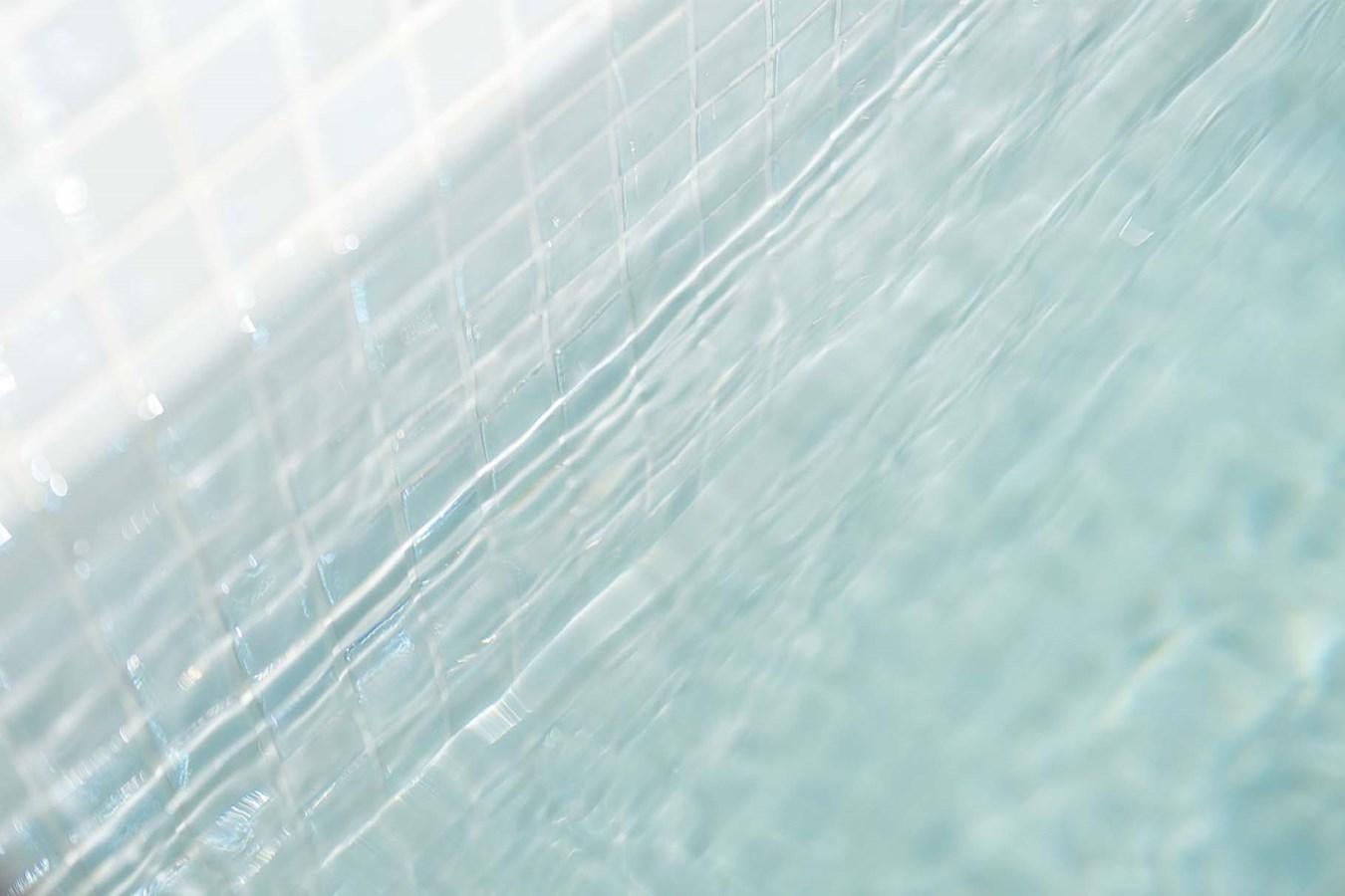 a close up of a blue water aboard ROCK X Yacht for Sale