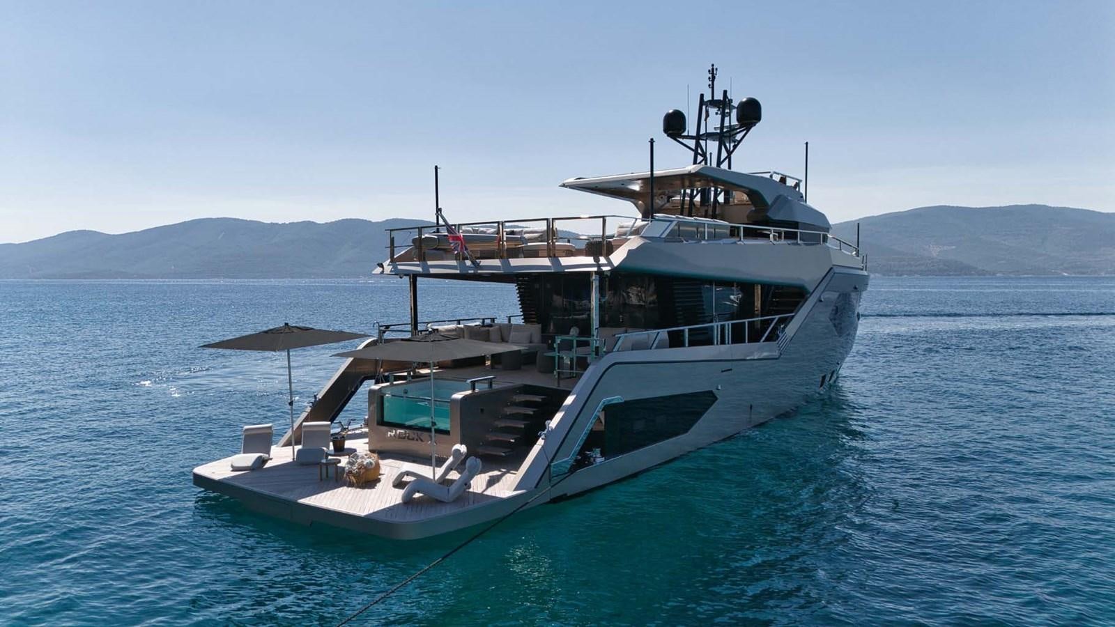 a boat in the water aboard ROCK X Yacht for Sale