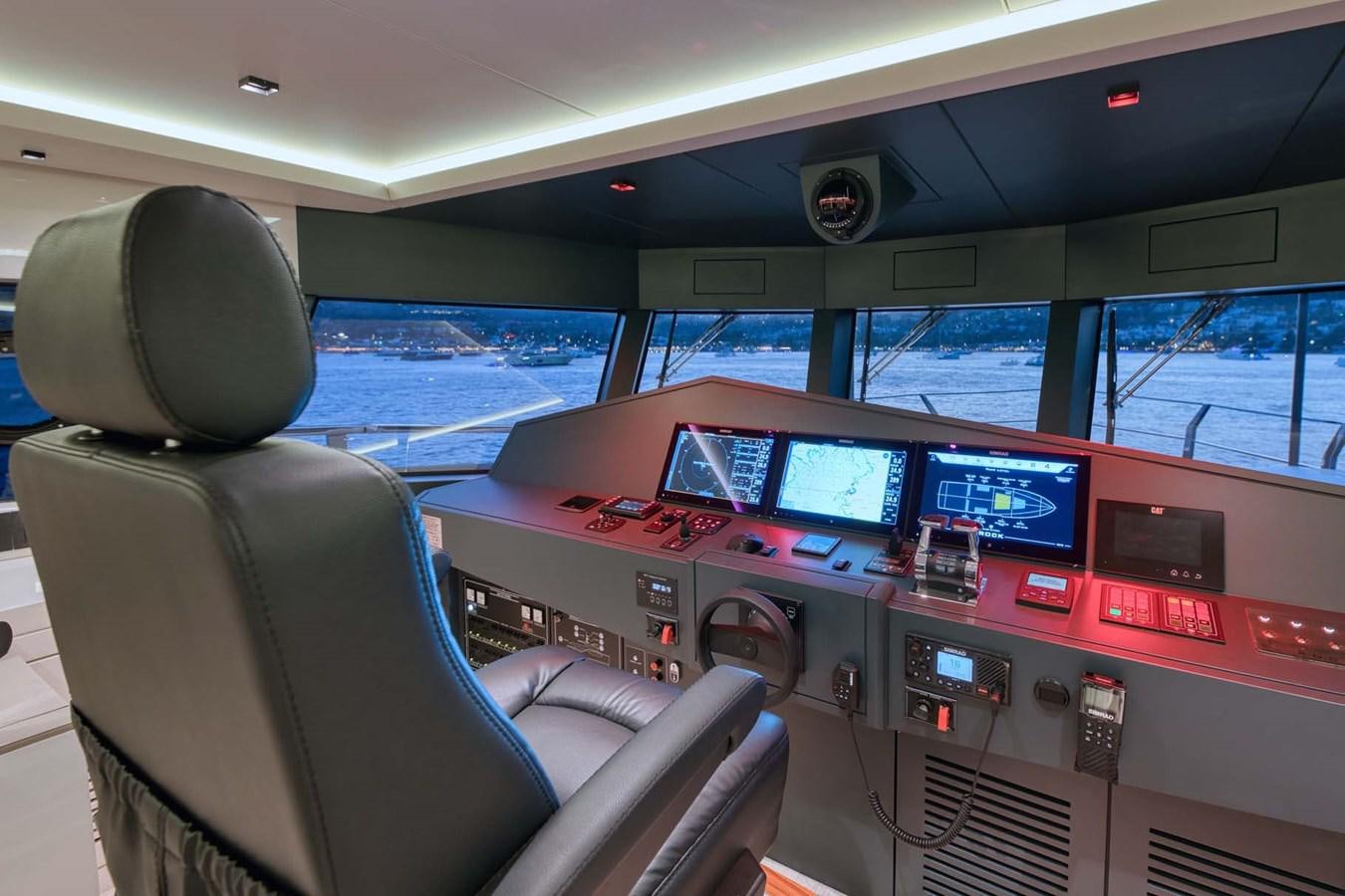 inside of a car with monitors and screens aboard ROCK X Yacht for Sale