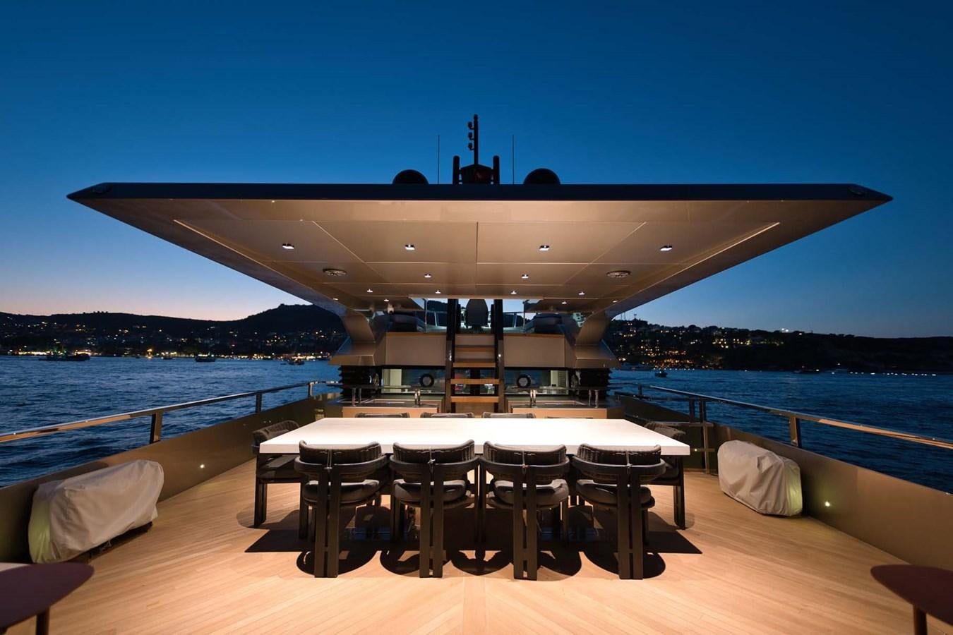 a large building with a pool aboard ROCK X Yacht for Sale