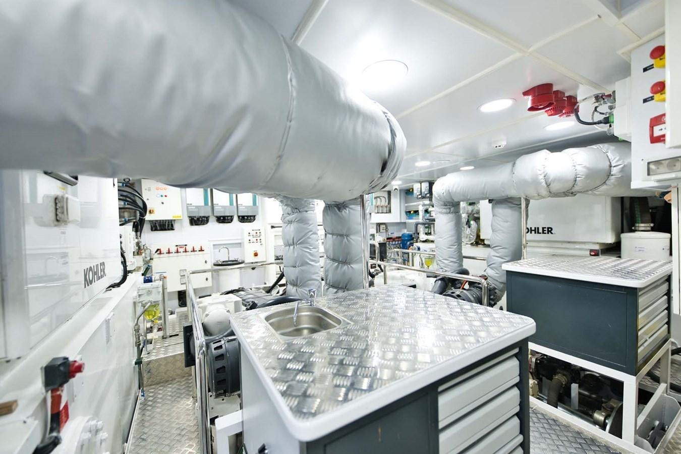 a large industrial machine aboard ROCK X Yacht for Sale