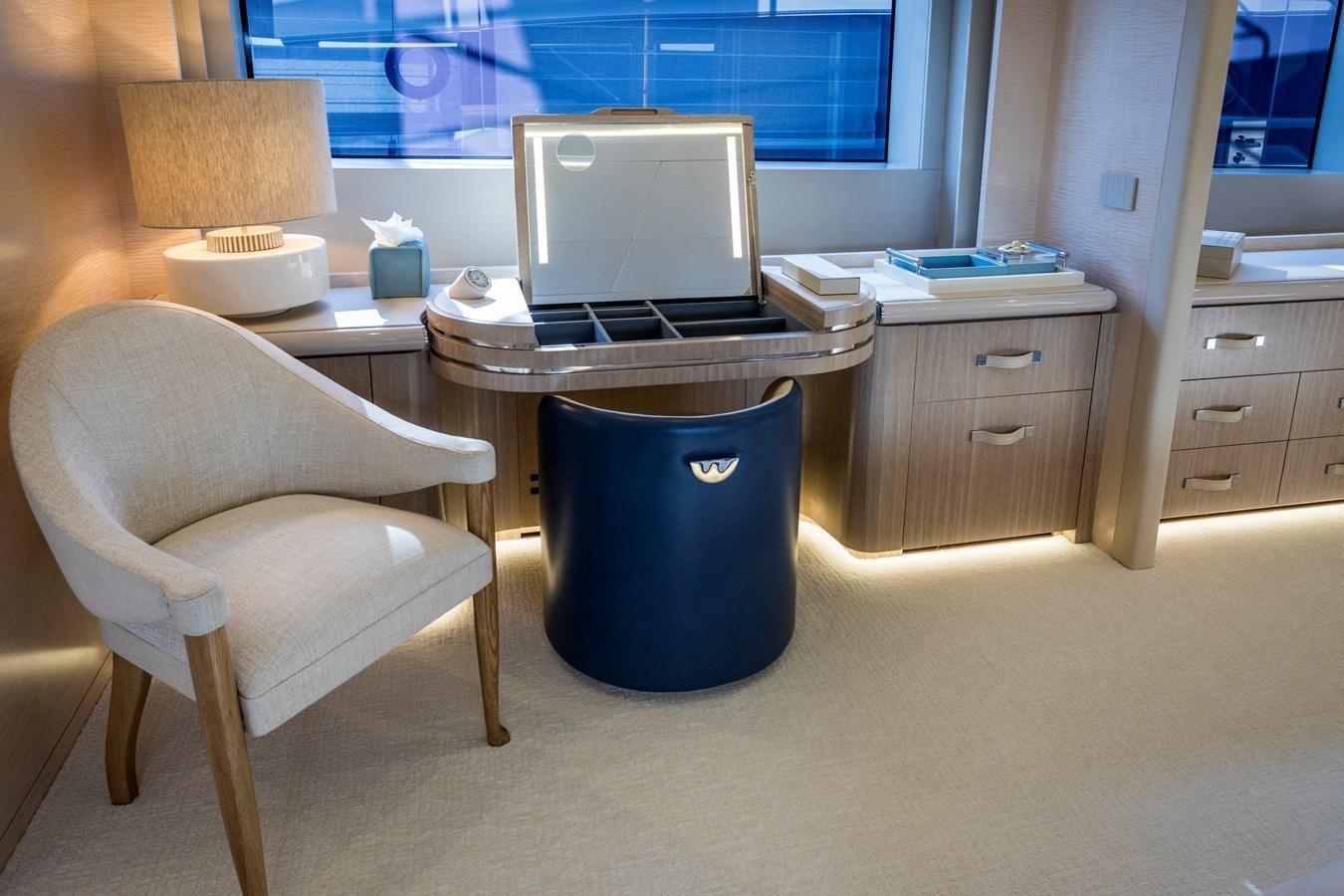 a chair and a desk in a room aboard MYSTERE Yacht for Sale