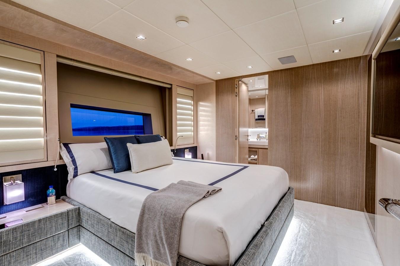a bed in a room aboard MYSTERE Yacht for Sale