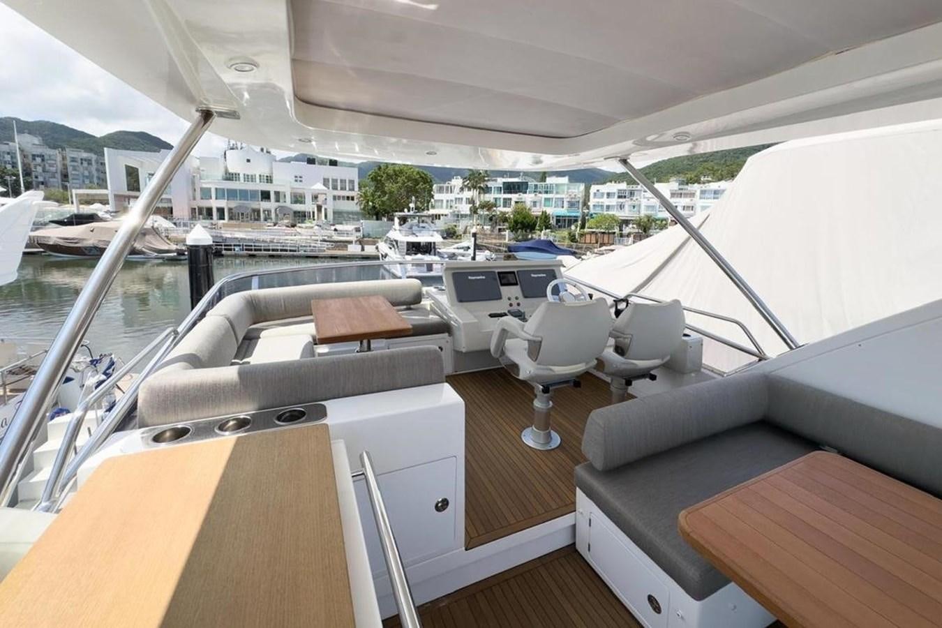 a boat with a view of a city aboard AZIMUT 66 FLY Yacht for Sale
