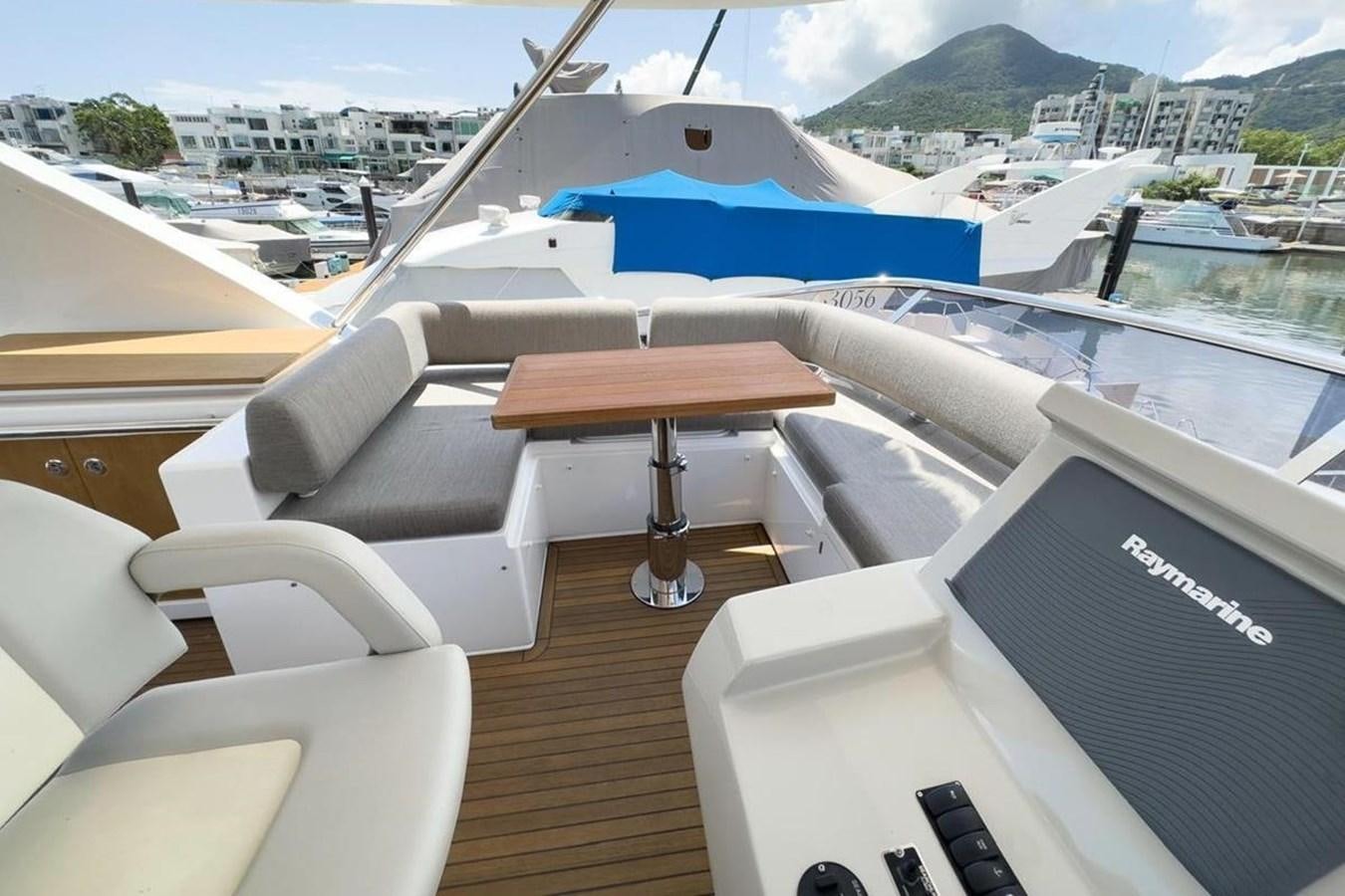 a table on a boat aboard AZIMUT 66 FLY Yacht for Sale