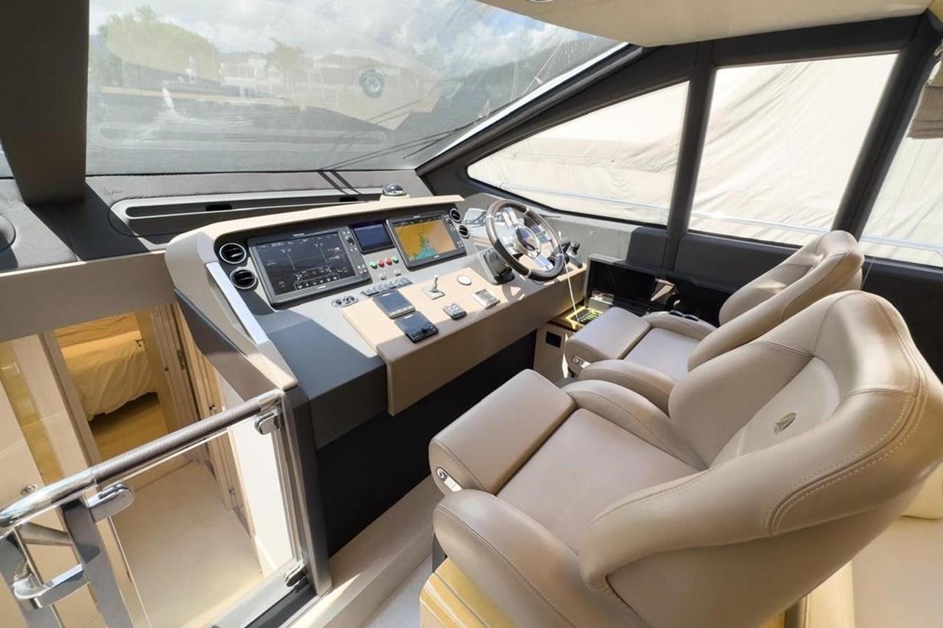 inside of a car aboard AZIMUT 66 FLY Yacht for Sale