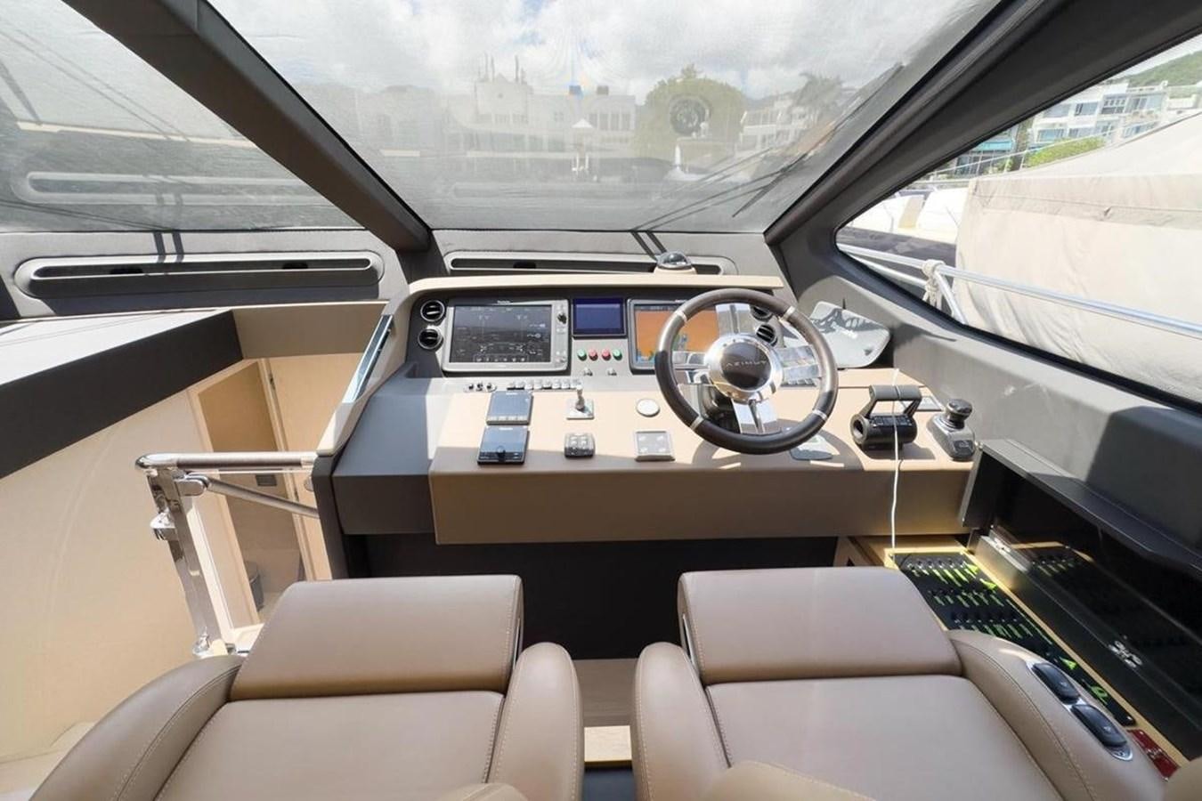 inside of a car aboard AZIMUT 66 FLY Yacht for Sale