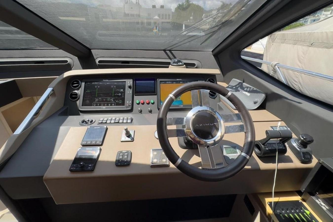 inside of a car aboard AZIMUT 66 FLY Yacht for Sale