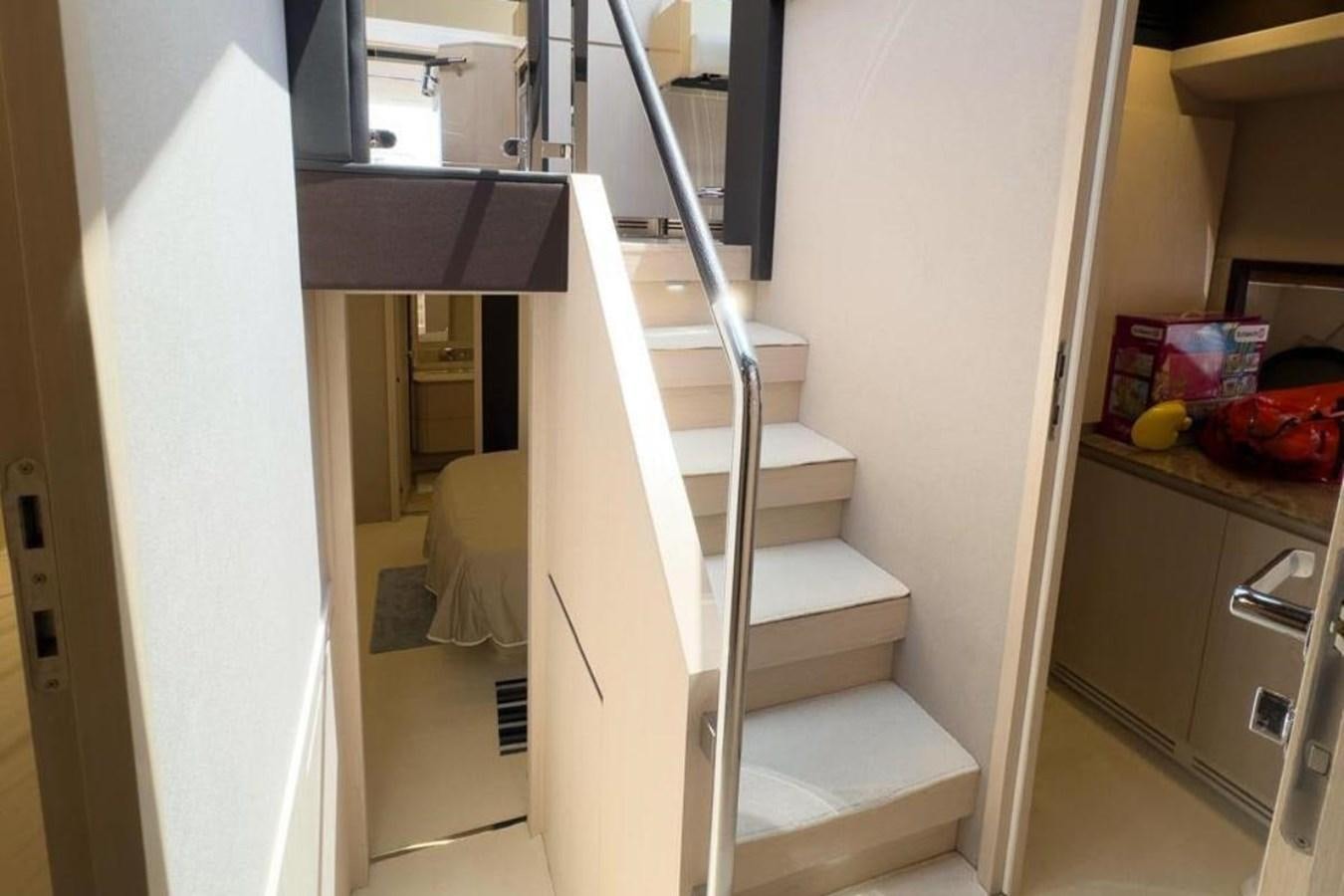 a ladder in a room aboard AZIMUT 66 FLY Yacht for Sale
