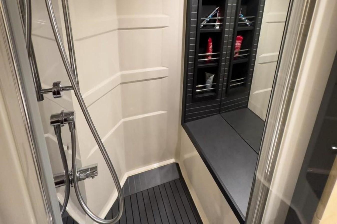 a metal door with a metal handle aboard AZIMUT 66 FLY Yacht for Sale
