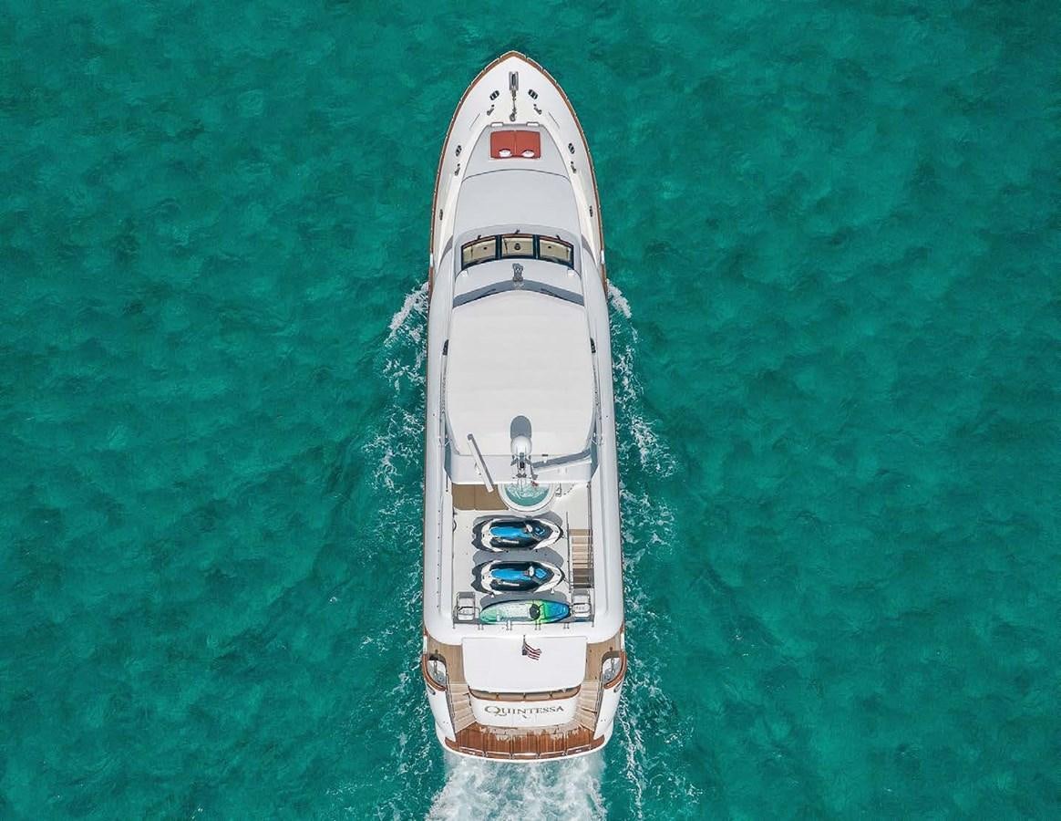 a white and red boat in the water aboard QUINTESSA Yacht for Sale