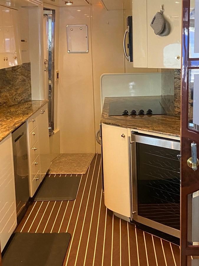 a kitchen with a stove and oven aboard QUINTESSA Yacht for Sale