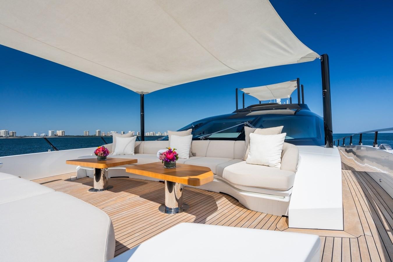 a room with a bed and a table aboard JACQPOT Yacht for Sale