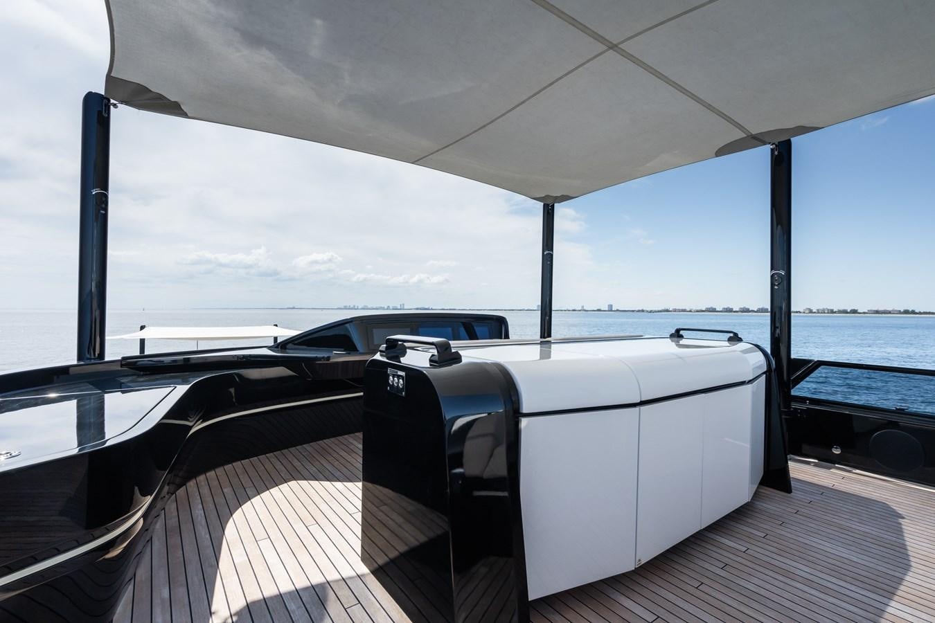 a boat on a deck aboard JACQPOT Yacht for Sale