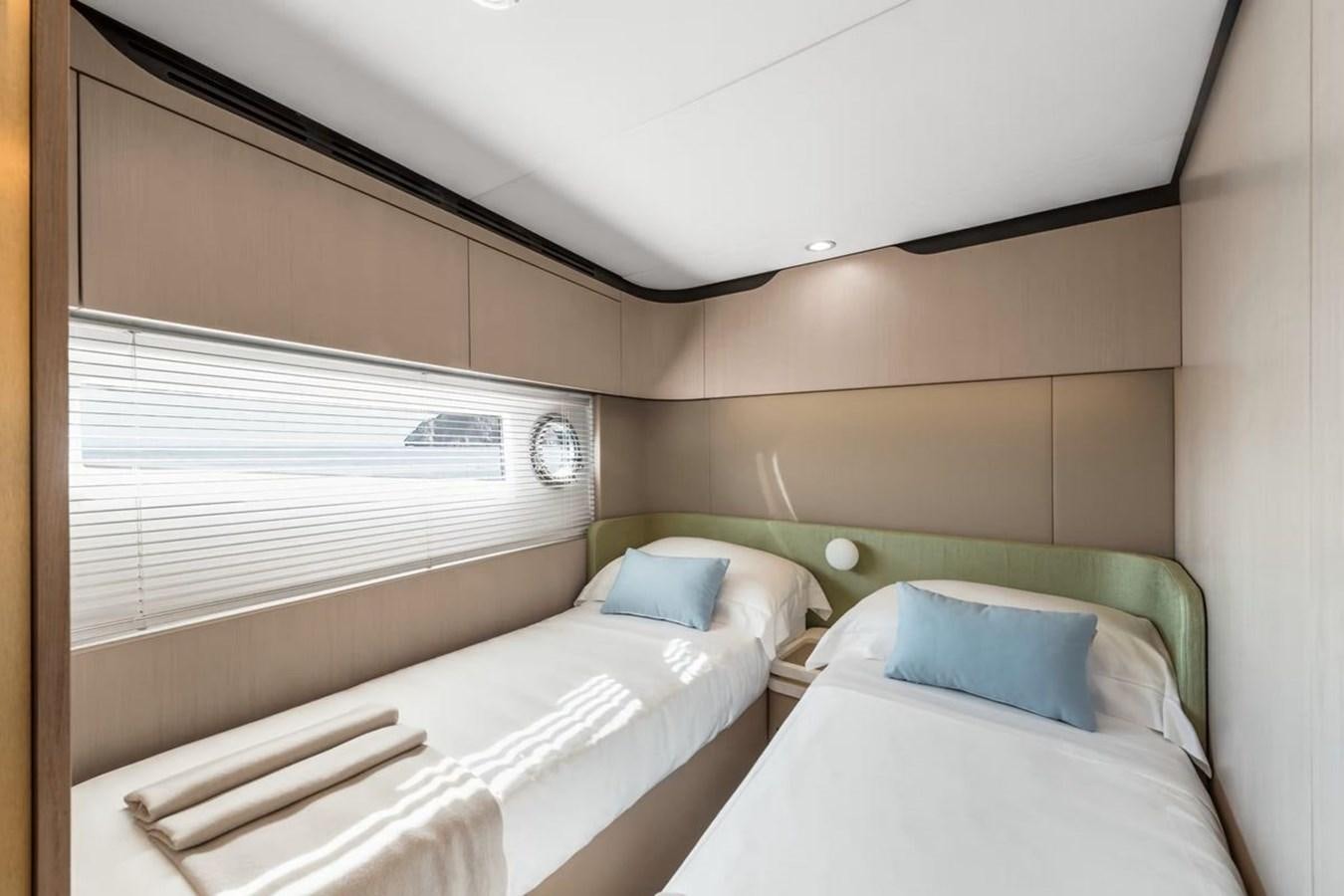 a couple of beds in a room aboard 2023 AZIMUT FLY 78 Yacht for Sale