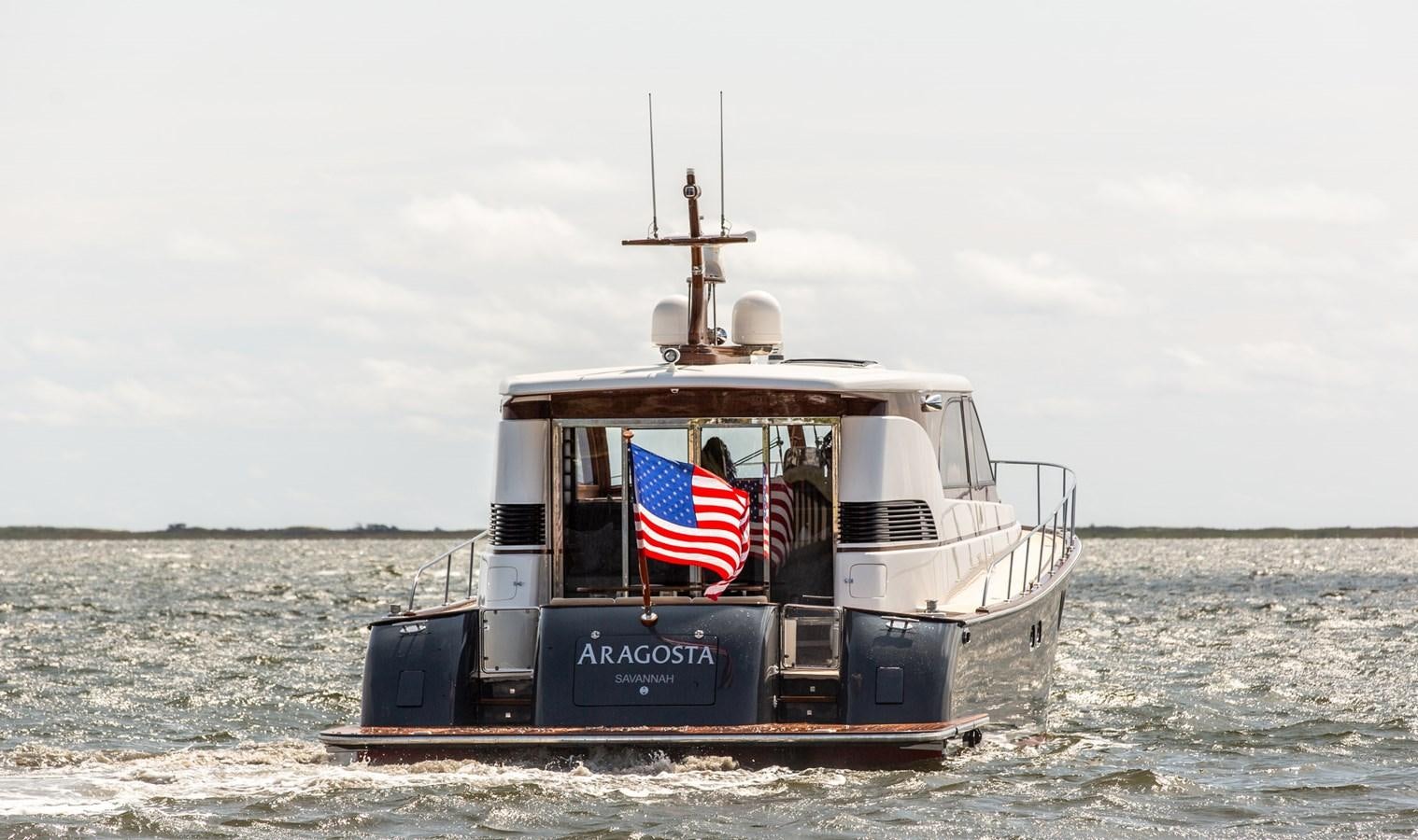 a boat on the water aboard ARAGOSTA Yacht for Sale