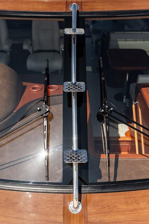 a guitar leaning against a wall aboard ARAGOSTA Yacht for Sale