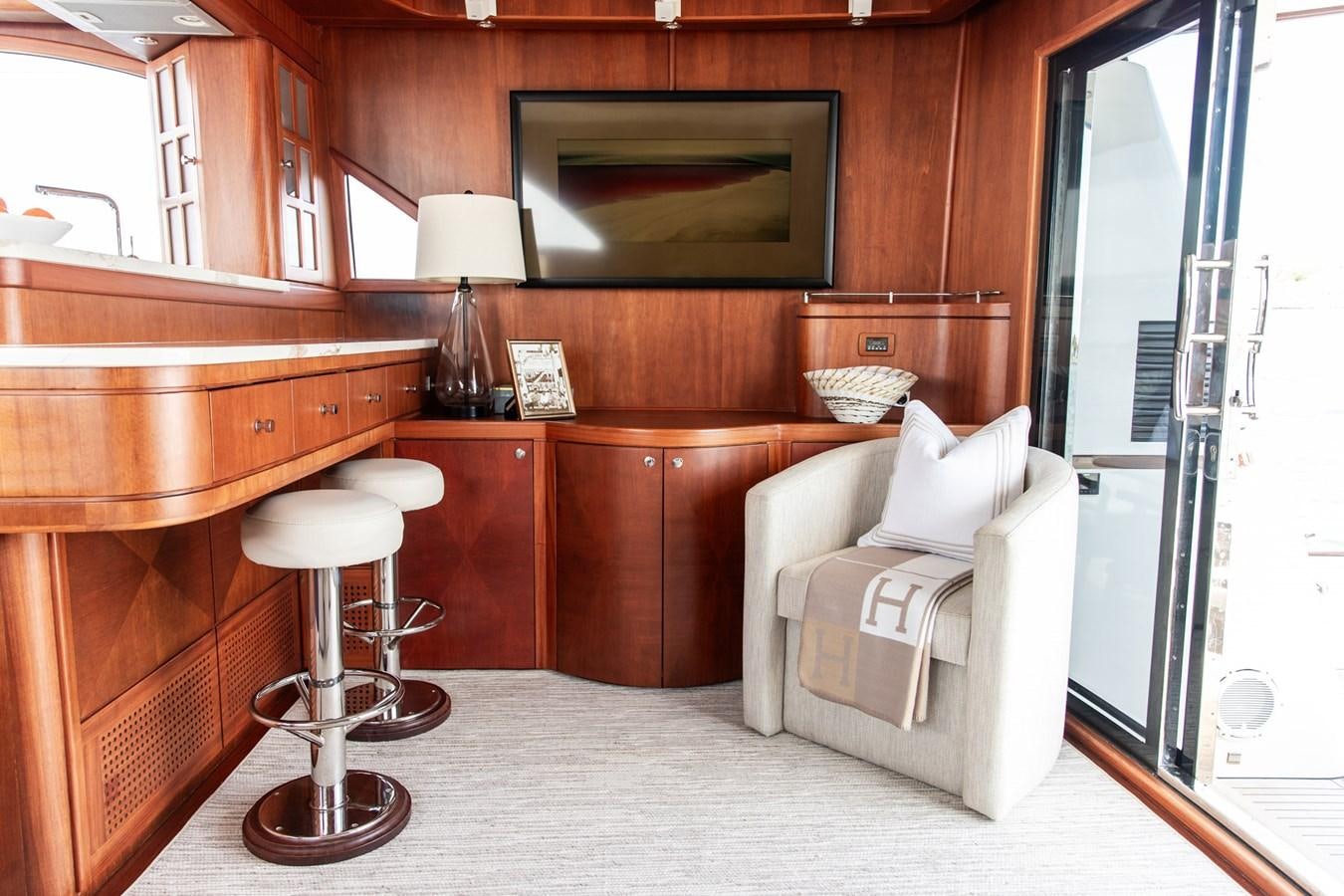 a room with a chair and a desk aboard ARAGOSTA Yacht for Sale