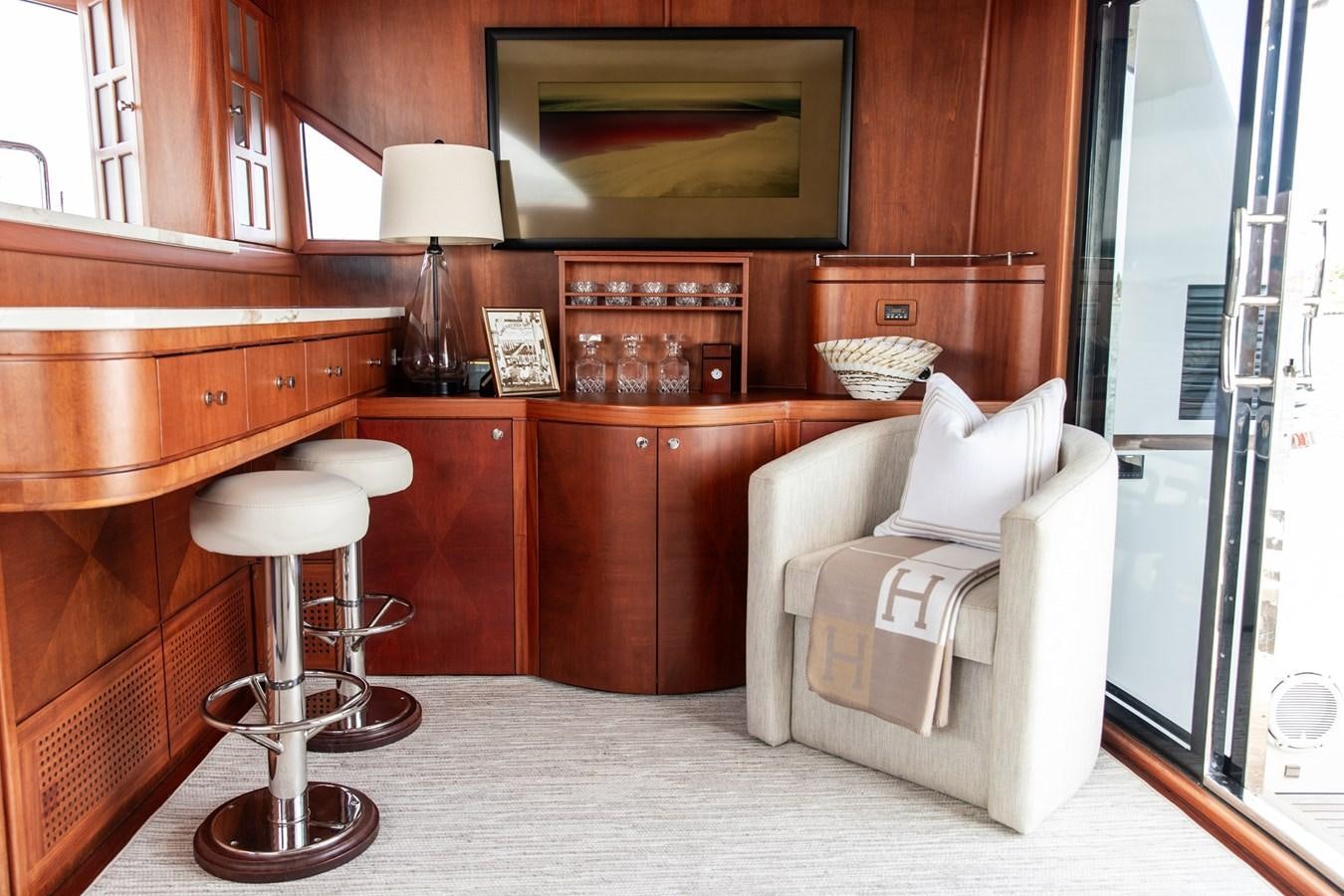 a room with a chair and a desk aboard ARAGOSTA Yacht for Sale