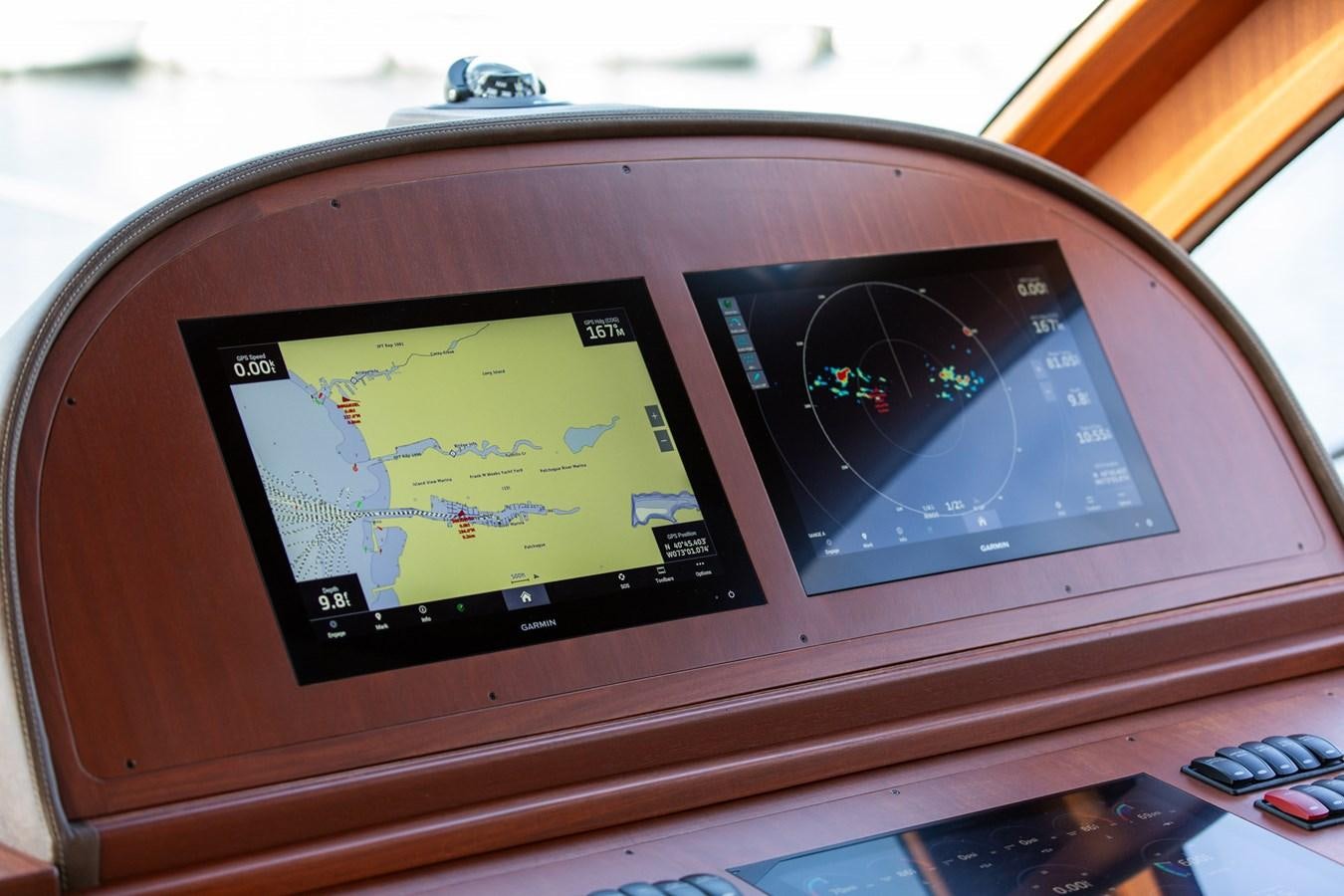 a computer with a screen and a keyboard aboard ARAGOSTA Yacht for Sale