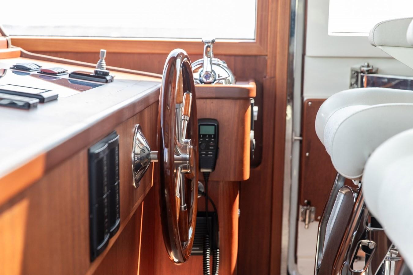 a guitar on a stand aboard ARAGOSTA Yacht for Sale